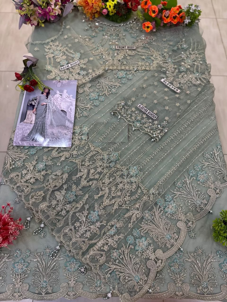 Net Heavy Embroidered Wedding Wear Saree - Unstitched